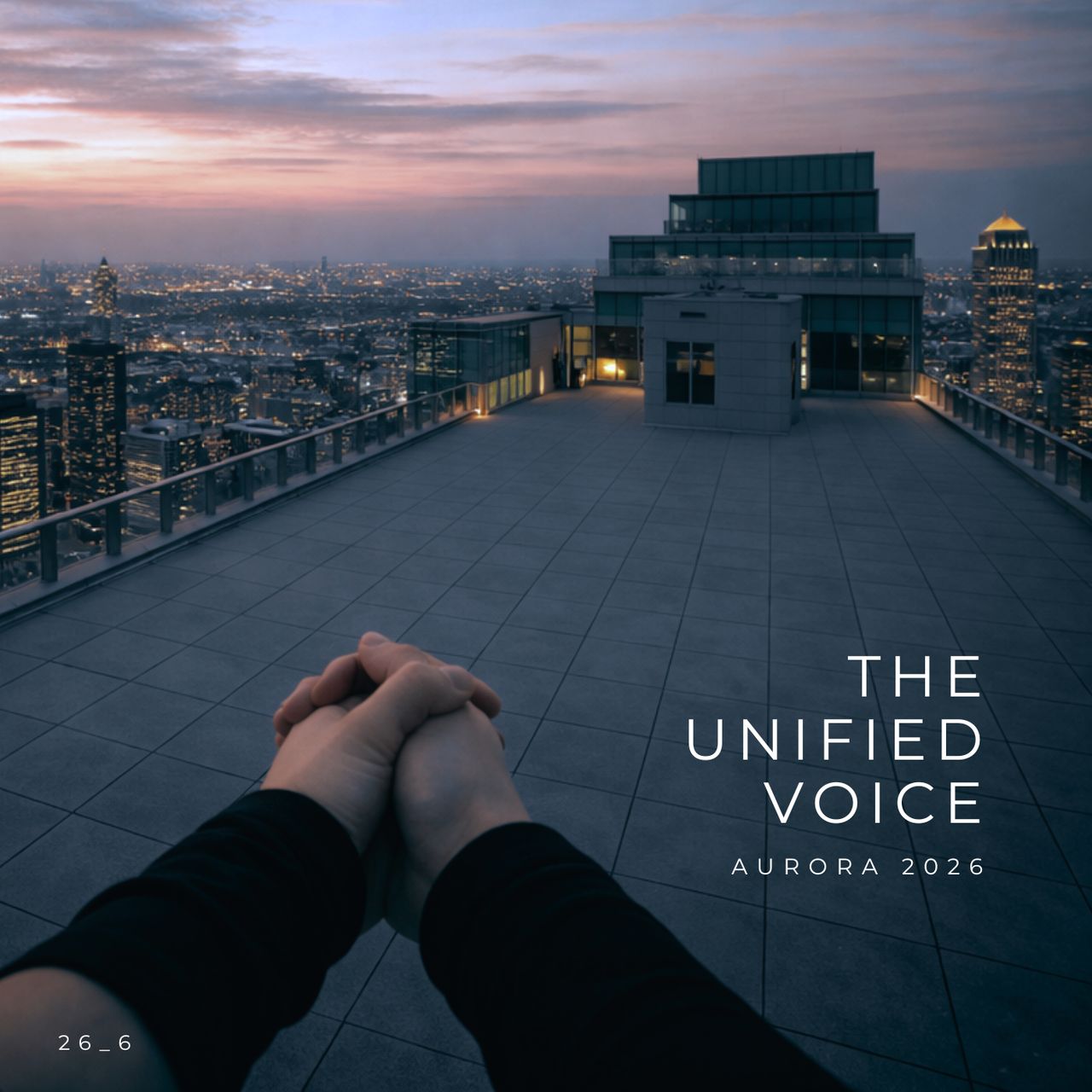 Hands clasped together in the foreground, set against a cityscape at dusk with a rooftop view.